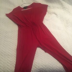 Red jumpsuit Kardashian Kollection